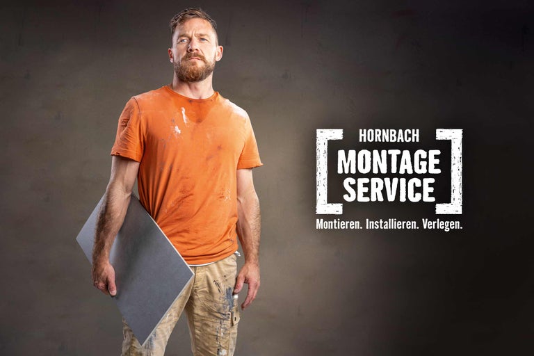 Handwerker mit Montage Service Fliesen