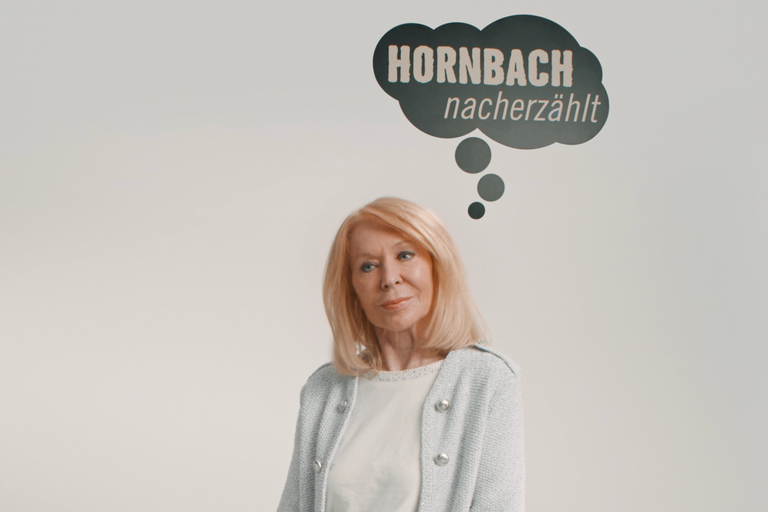 Frau vor Hornbach Logo nacherzählt