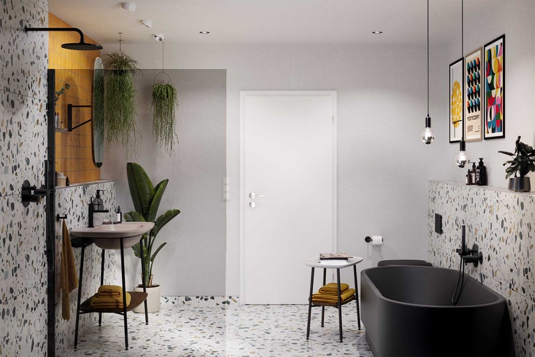 Badezimmer mit Waschbecken, Badewanne, Tür und Terrazzoboden