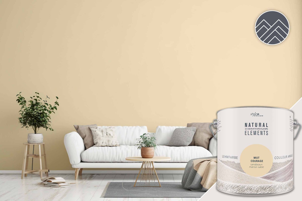 Wohnzimmer mit Lehmfarbe in Sandbraun und Farbdose