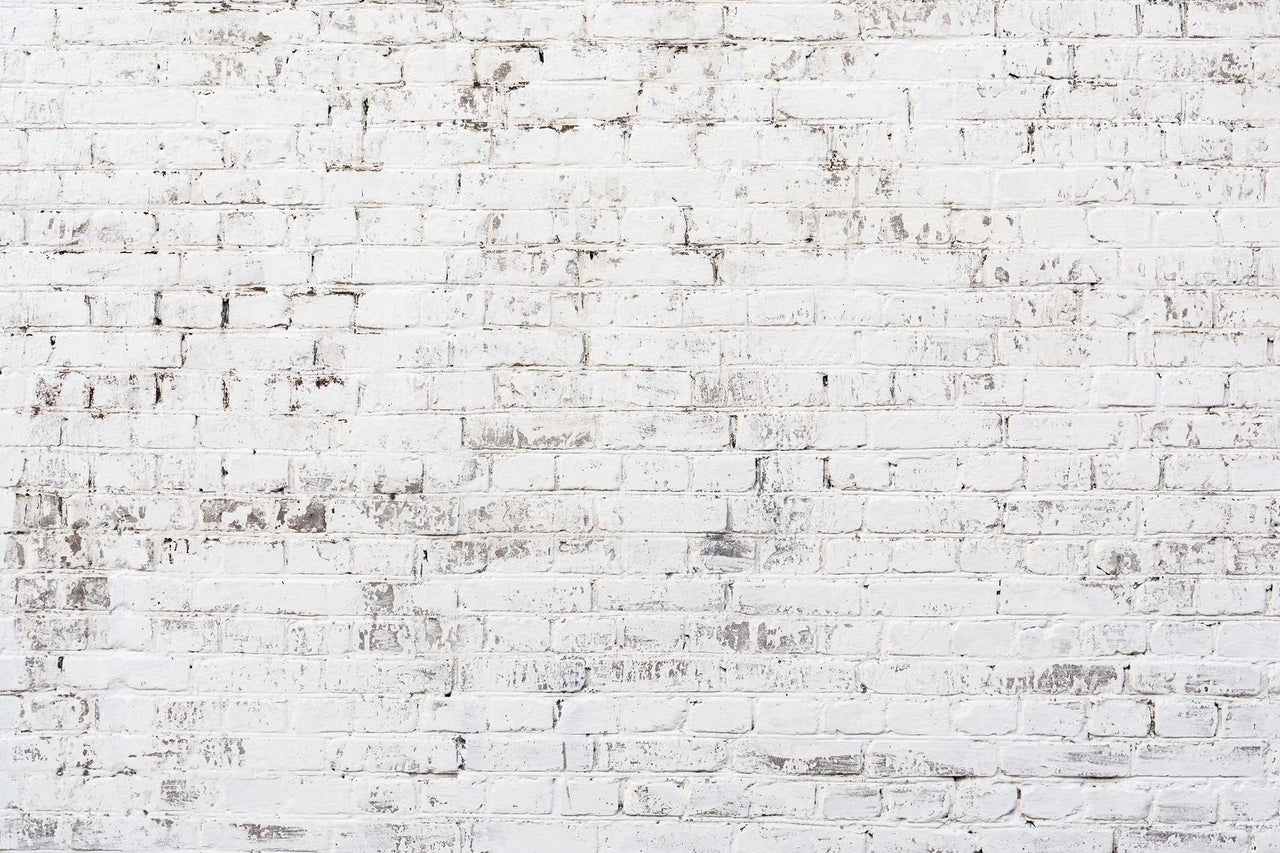 Weiße Ziegelwand als Hintergrund