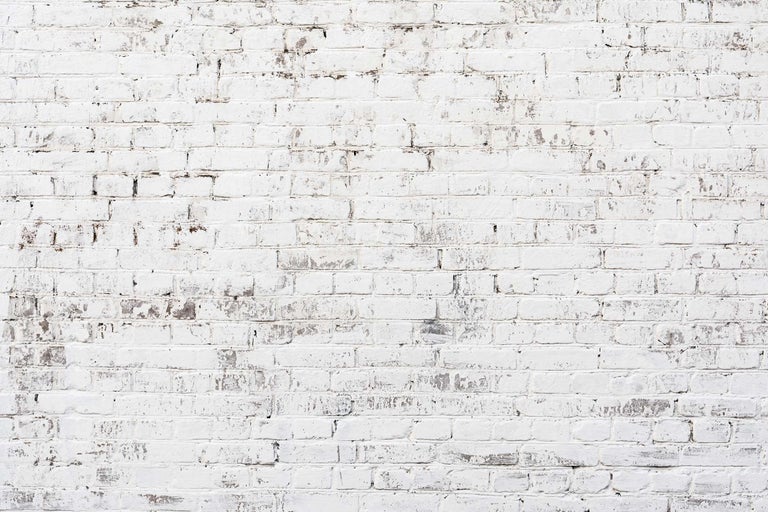 Weiße Ziegelwand als Hintergrund