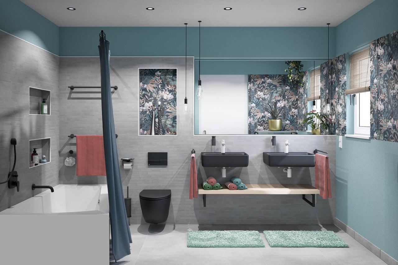 Helles Badezimmer mit Badewanne, Toilette und Waschbecken