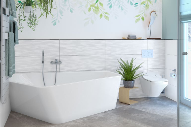Modernes Badezimmer mit freistehender Badewanne, wandhängendem WC und Pflanzen