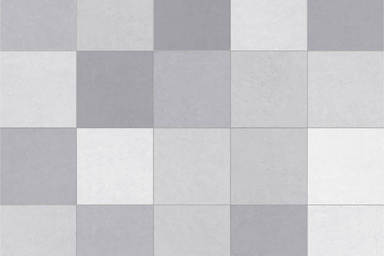 Quadratische Bodenfliesen oder Wandfliesen im Schachbrettmuster mit strukturierter Oberfläche in verschiedenen Abstufungen.