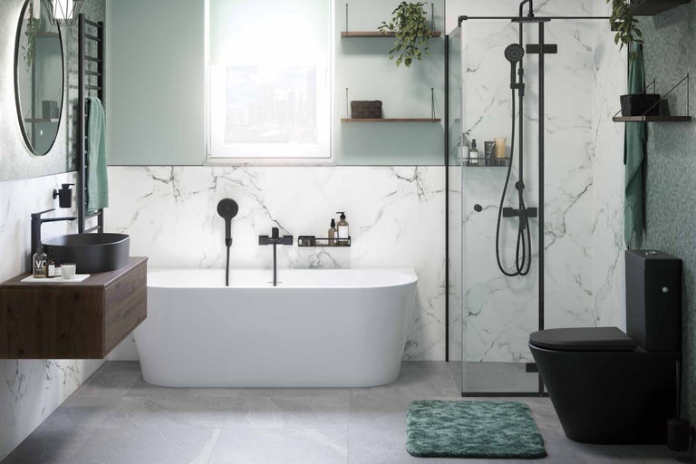 Modernes Badezimmer mit Badewanne, Dusche, Waschtisch und Toilette in einem hellen Design.