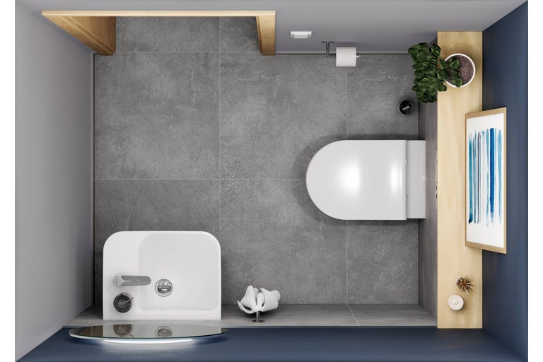 Draufsicht eines Badezimmers mit Toilette, Waschbecken, Ablageflächen und Dekoration