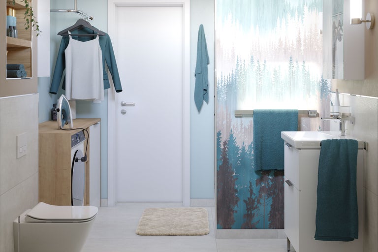 Modernes Badezimmer mit Waschmaschine, Waschbecken, Toilette und Dekoration