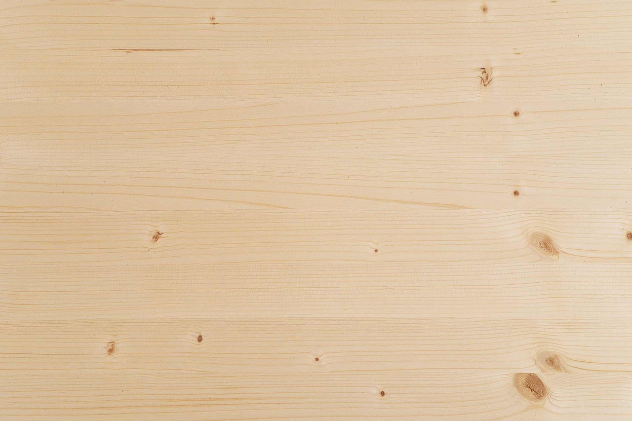 Holzplatte mit Maserung und Astlöchern