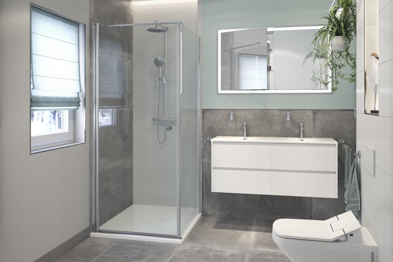 Modernes Badezimmer mit Dusche, Waschtisch und Toilette.