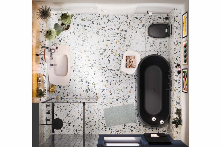 Vogelperspektive eines Badezimmers mit Badewanne, Waschtisch, Toilette und Fliesenboden