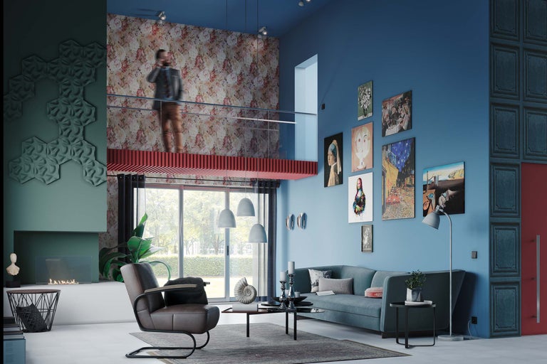 Wohnzimmer mit Sofa, Sessel, Couchtisch und Kunst an den Wänden