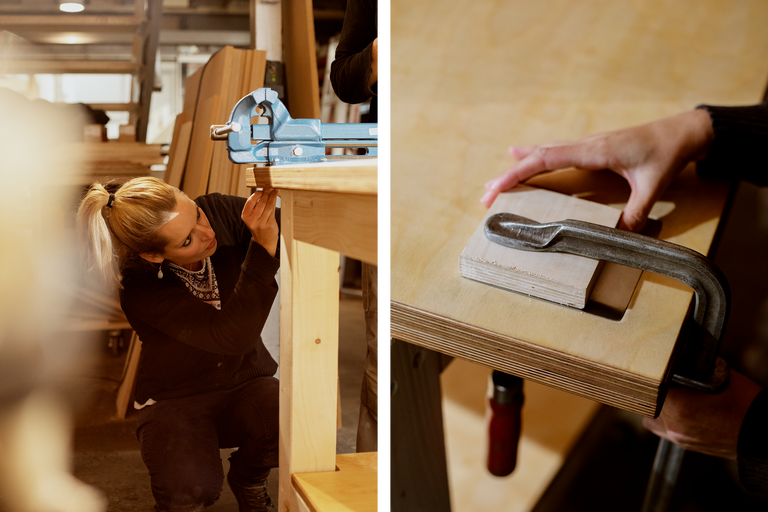 Werkstattszene: Frau arbeitet an Holzkonstruktion mit Schraubzwingen und Schraubstock