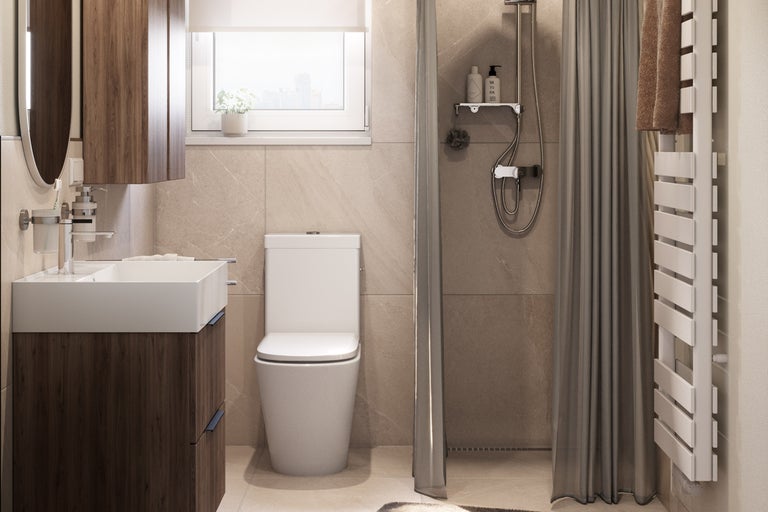 Badezimmer mit Waschbecken, Toilette und Dusche