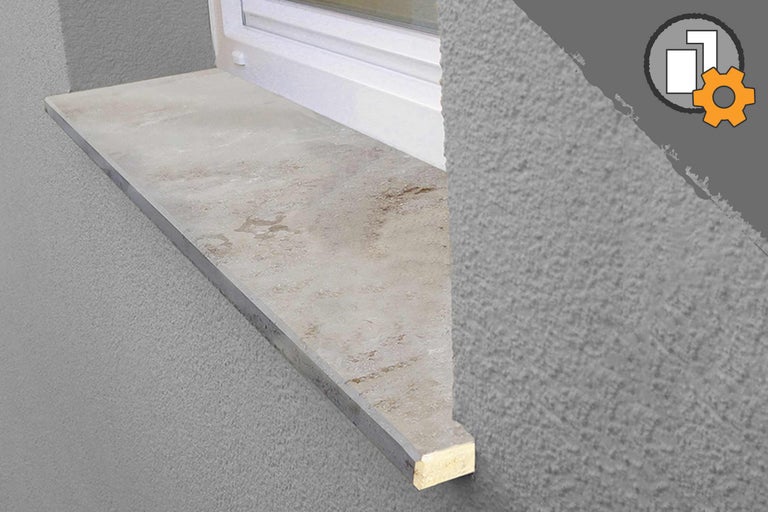 Fensterbank aus Stein an einer Fassade