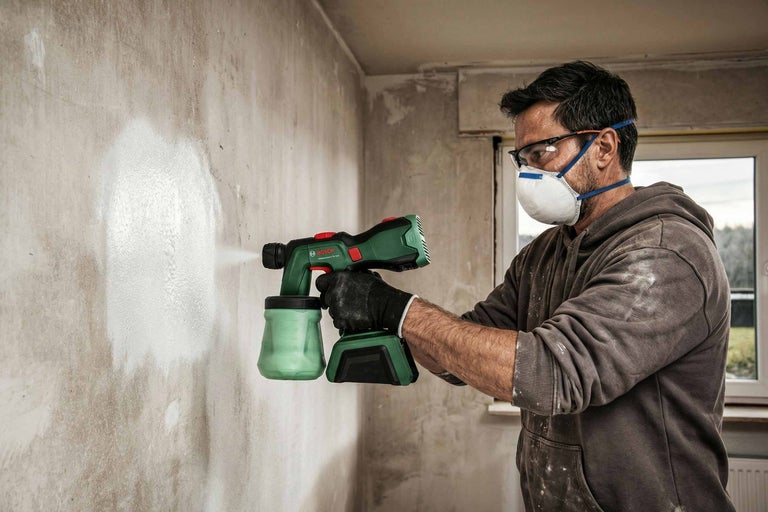 Wandfarbe sprühen
