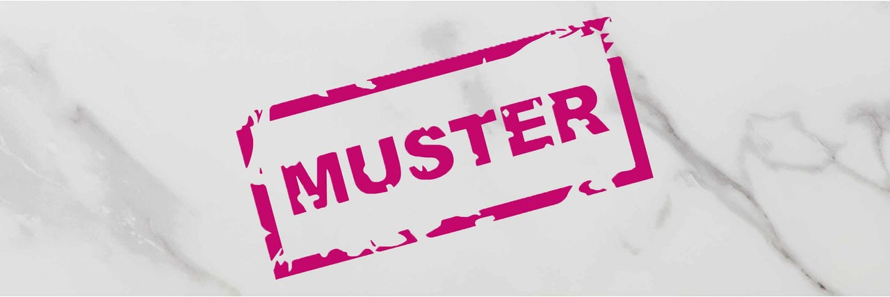 Musterfliese mit dem Aufdruck Muster