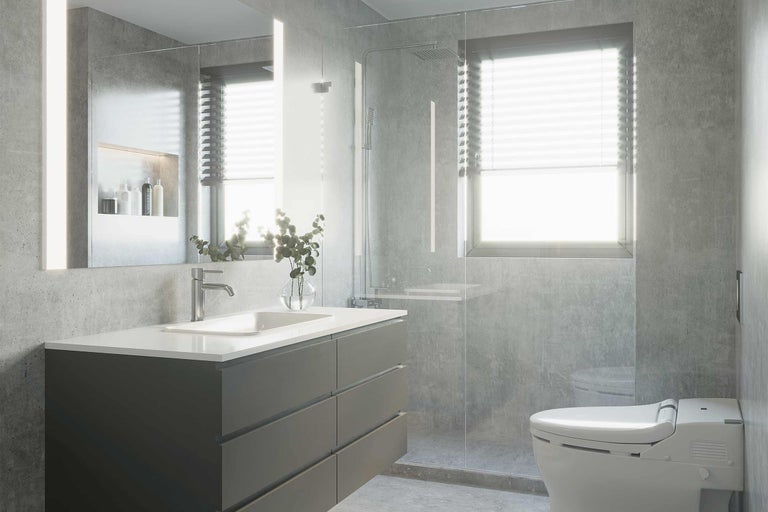 Helles Badezimmer mit Waschtisch, Spiegel, Dusche und Toilette in modernem Design