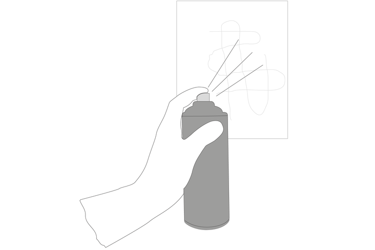 Eine Hand hält eine Sprühdose und sprüht auf eine Oberfläche.