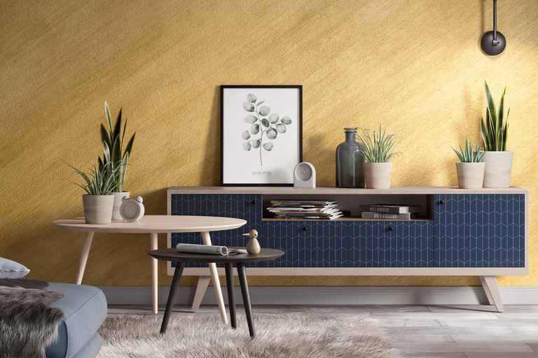 Wohnzimmer mit Lowboard, Tisch und Dekoration