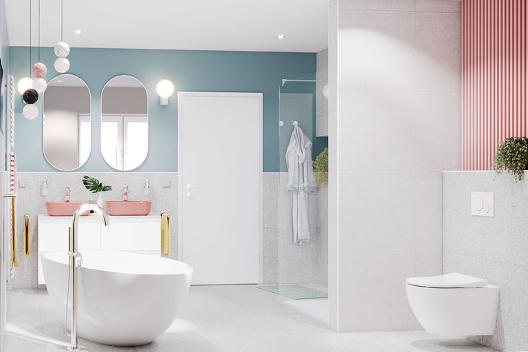 Modernes Badezimmer mit Badewanne, Waschtischen und Toilette