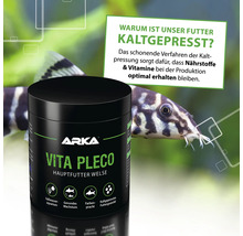 Arka Vita Pleco Hauptfutter Welse Dose vor einem Aquarium mit Welsen