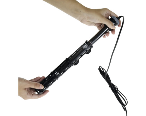 Aquarienheizstab in der Hand, Heizgerät für Aquarien