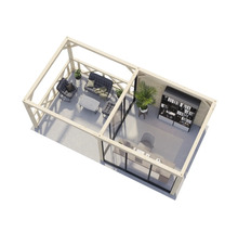 Helles Gartenhaus mit Terrasse, Sitzmöbeln und Büroausstattung