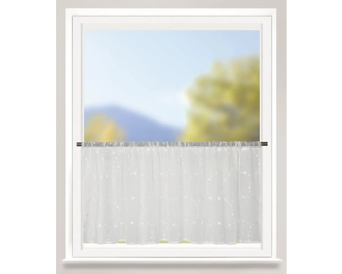 Gardinenstore mit Sternenmuster vor einem Fenster