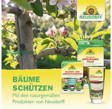 Neudorff Produkte für den Baumschutz, dargestellt neben einem blühenden Baumzweig