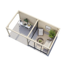 Überblick über ein offenes Gartenhaus mit Grillplatz und Sitzecke