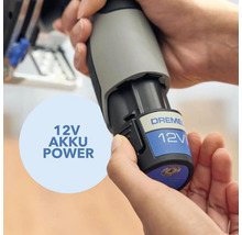 Dremel 12 Volt Akku wird von Händen gehalten