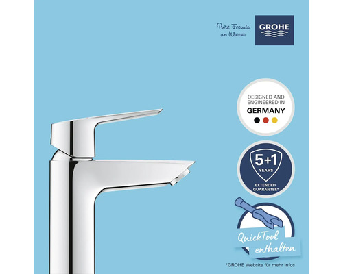 Glänzende Armatur mit Grohe Logo, QuickTool Symbol und Siegel für erweiterte Garantie.