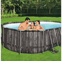 Runder Aufstellpool mit Stahlrahmen und Holzoptik, mit Familie im Garten