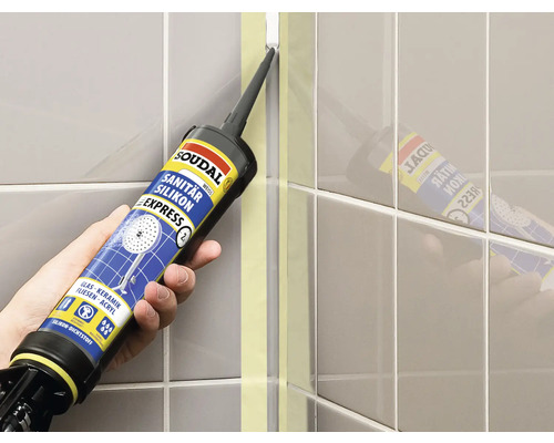 Auftragen von Sanitärsilikon auf Fliesen mit einer Kartuschenpistole