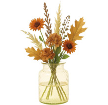 Dekoratives Blumenarrangement in einer Glasvase mit Sonnenblumen und Herbstlaub