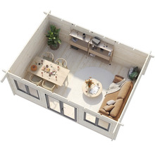 Innenansicht eines Gartenhauses mit Essbereich und Sitzecke