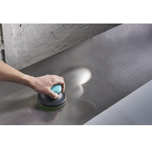 Reinigung einer Metalloberfläche mit einem Reinigungspad