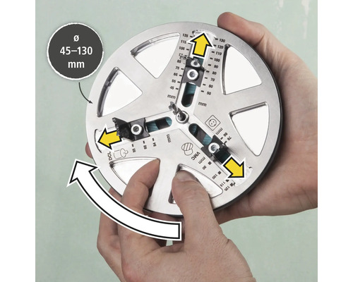 Ein Werkzeug zum genauen Anzeichnen von Bohrlöchern mit einem Durchmesser von 45 bis 130 Millimeter wird von zwei Händen gehalten.