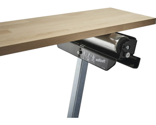 Wolfcraft Logo mit Materialstütze und Werkstück