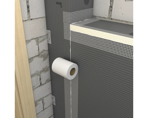 Innenansicht einer Mauer mit Dämmung und Dichtband.