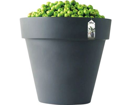 Großer runder Pflanztopf von elho in Anthrazit, gefüllt mit grünen Äpfeln zur Veranschaulichung der Größe.