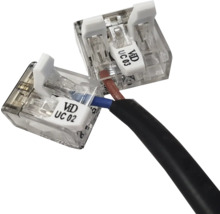 Transparente Hebelklemmen für elektrische Kabelverbindungen.