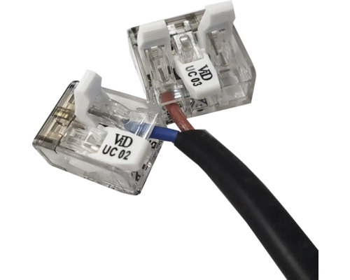 Transparente Hebelklemmen für elektrische Kabelverbindungen.