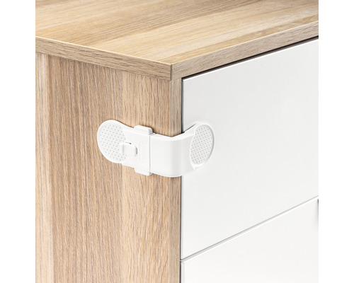 Kindersicherung an einer Kommode befestigt