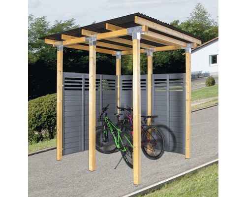 Fahrradunterstand aus Holz mit zwei Fahrrädern