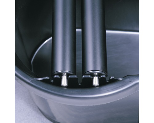 Detailaufnahme einer Walze in einem Auffangbehälter