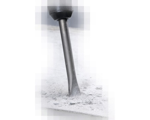 Meißel in der Anwendung zum Bearbeiten von Stein