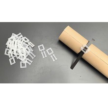 Verpackung mit Rolladenklammern und eine Rollade mit Rolladenklammer.