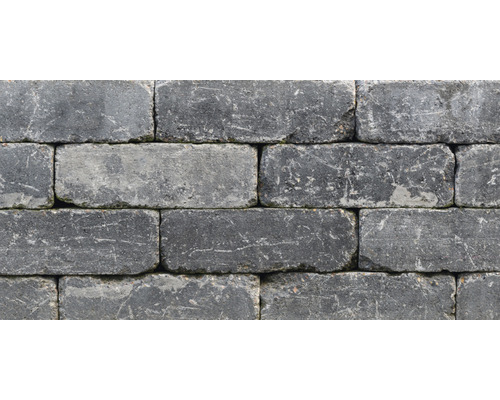 Nahaufnahme einer Mauer aus Pflastersteinen